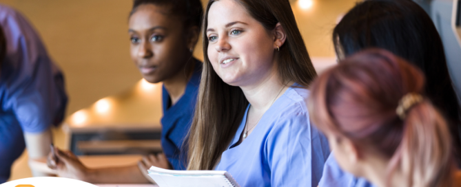 Nursing students like these may benefit from a professional caregiving job that provides experience for their chosen field.