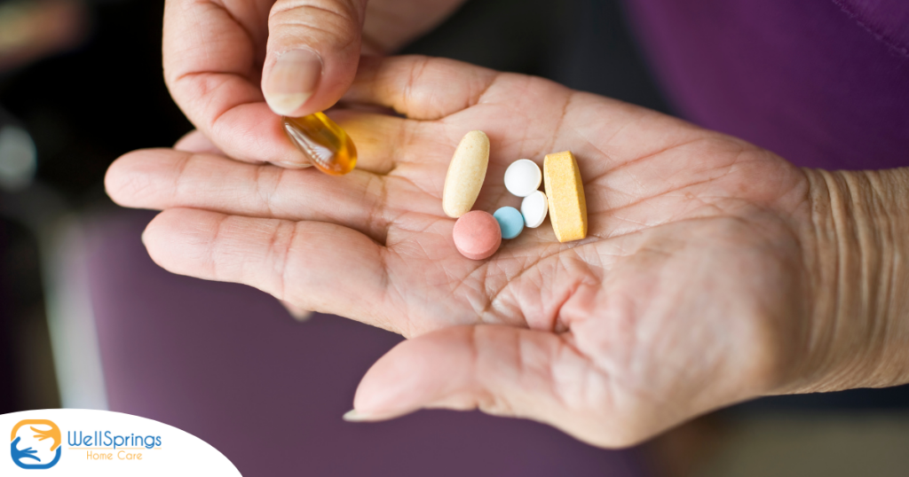 A woman holds pills in her hand, representing medication management.